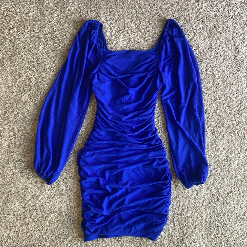 royal blue ruffle dress with flowy puff sleeves